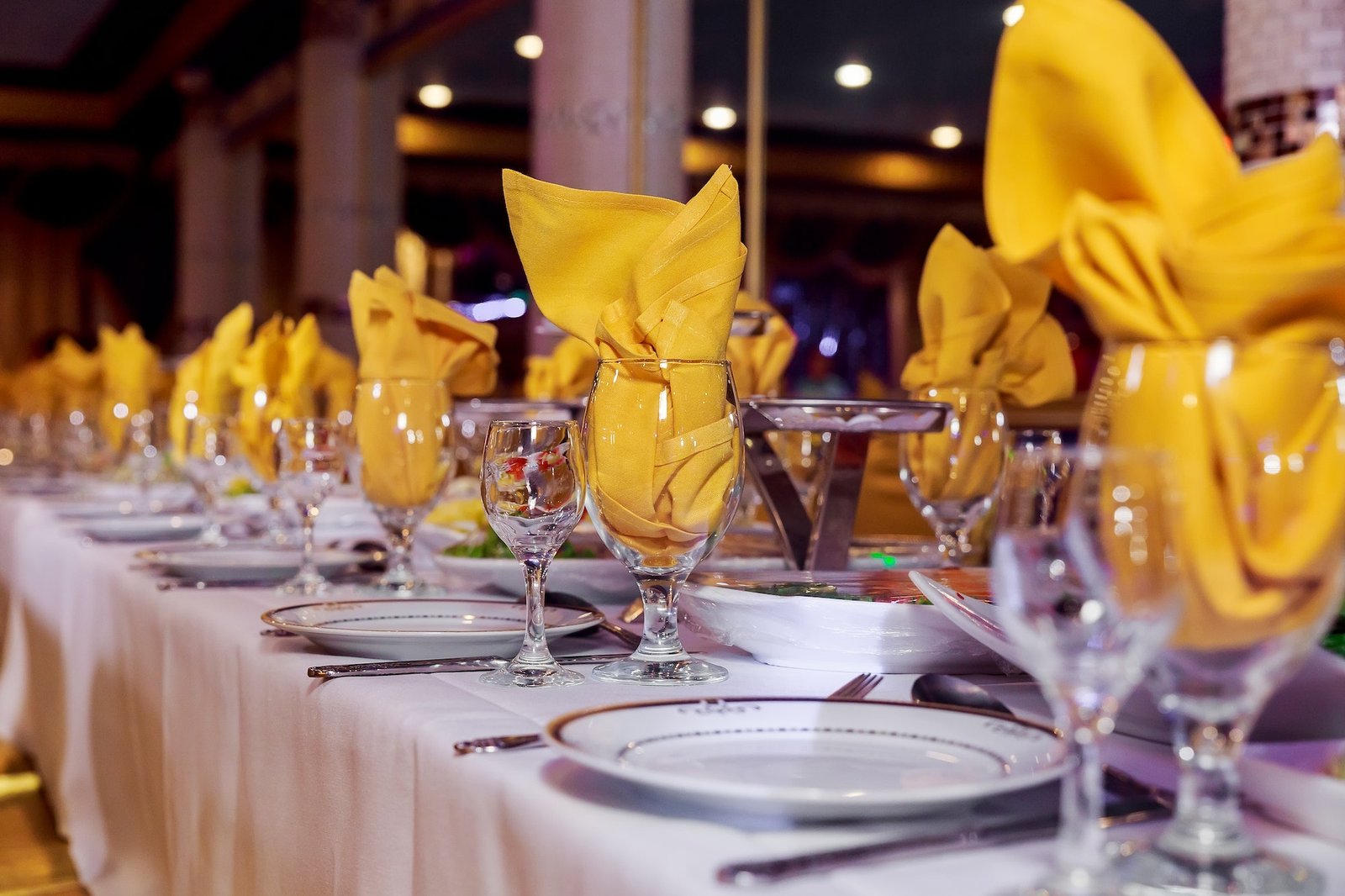 Beautifully decorated catering banquet table with different food snacks and appetizers with sandwich