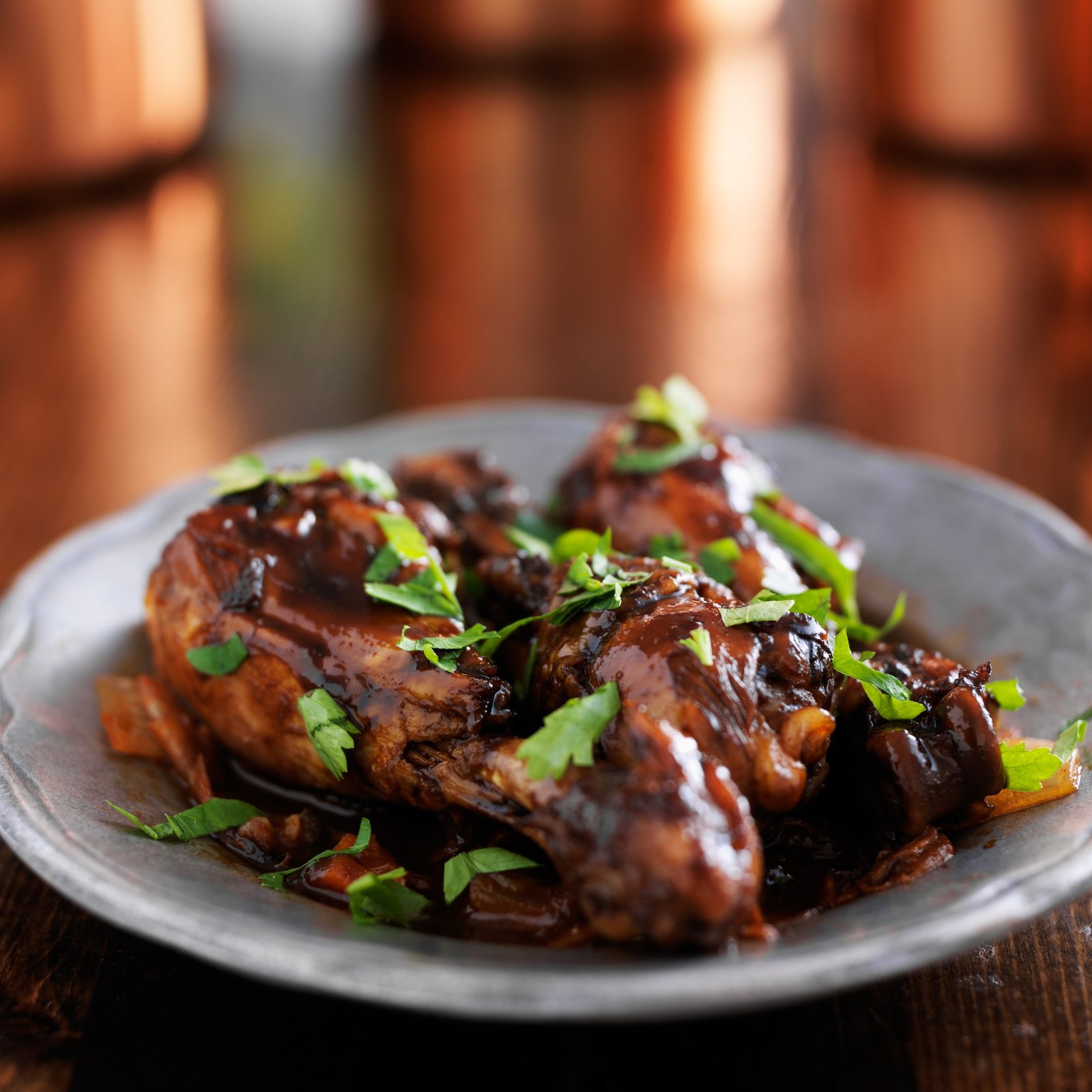 trinidad chicken with cilantro as garnish